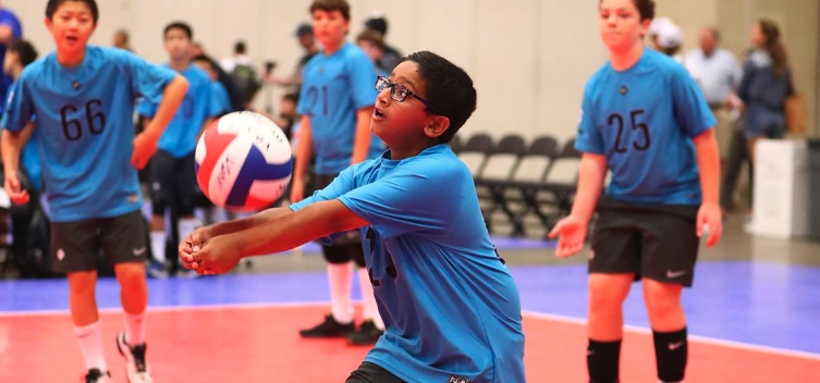 boys playing volleyball